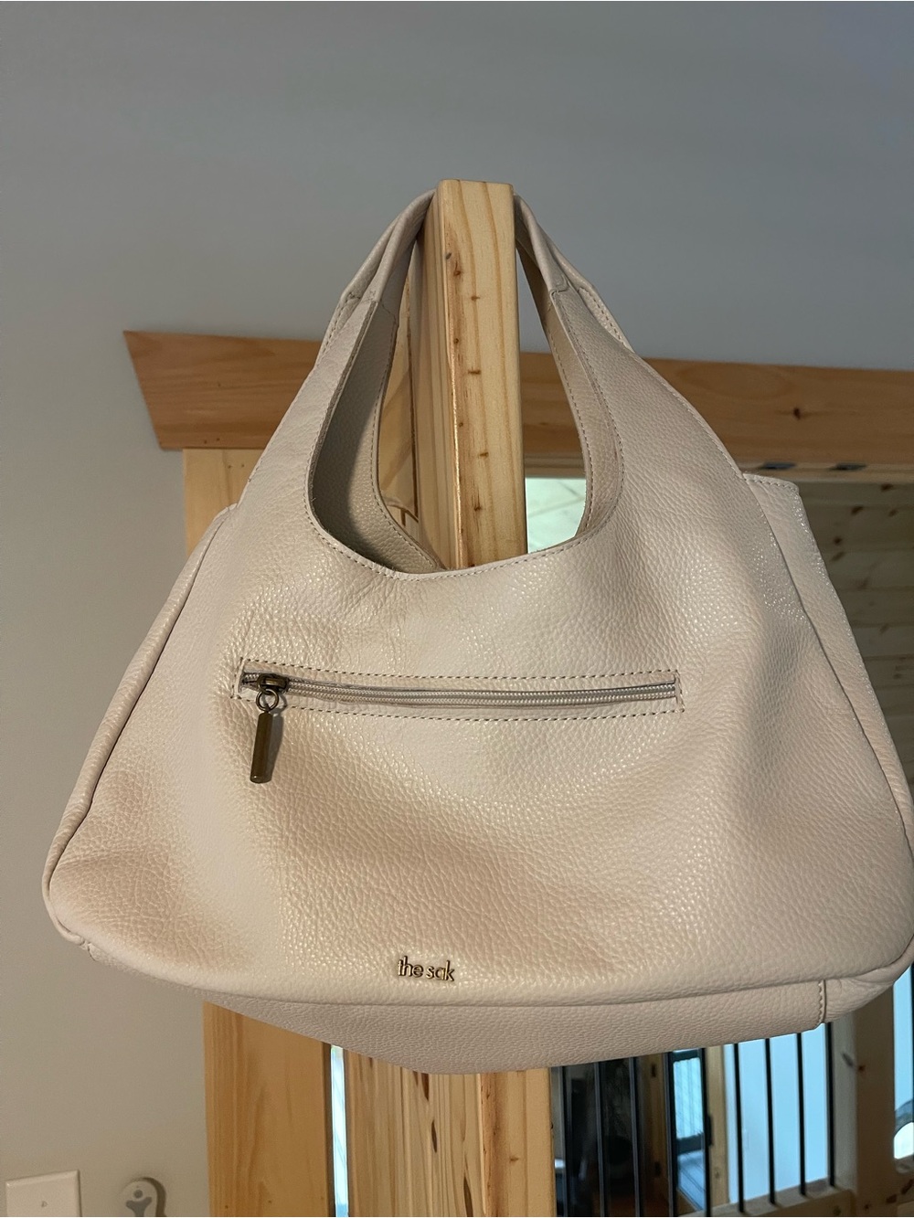 The Sak Pebbled Leather Hobo Tote in off-white